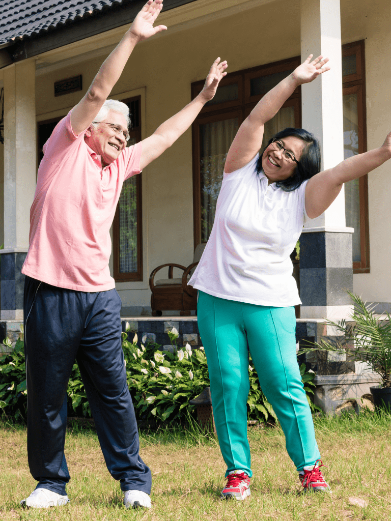 Two people starting mobility regimen slowly with simple and low intensity exercises. 