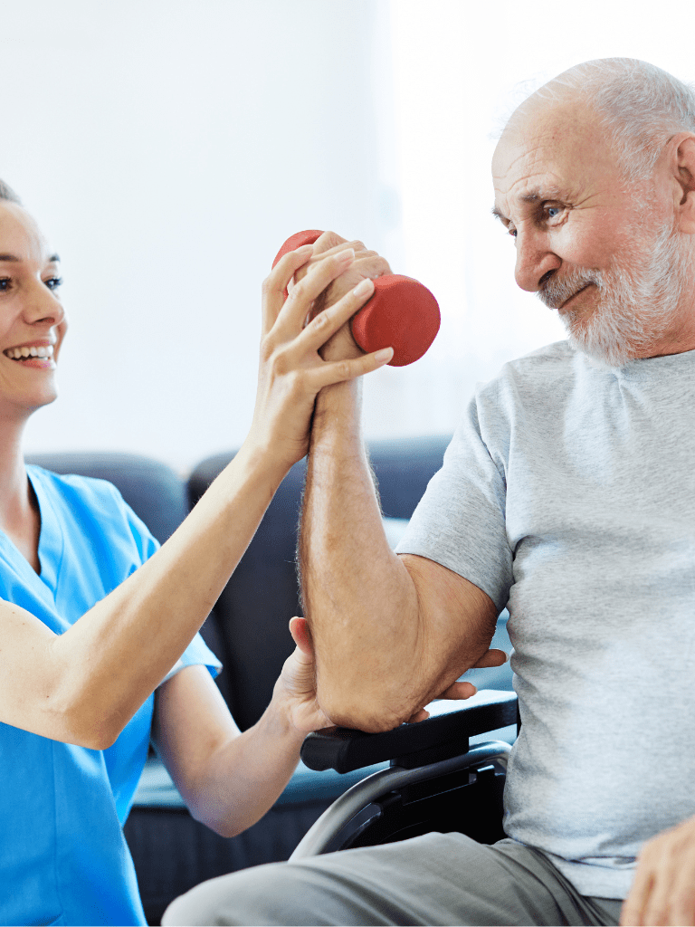 Physical Therapist assisting patient that has physical limitations with weight exercises. 