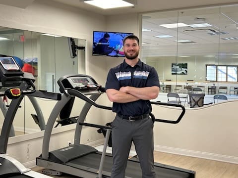 Todd Roush standing in the fitness center at Immanuel Living, located in Kalispell, Montana