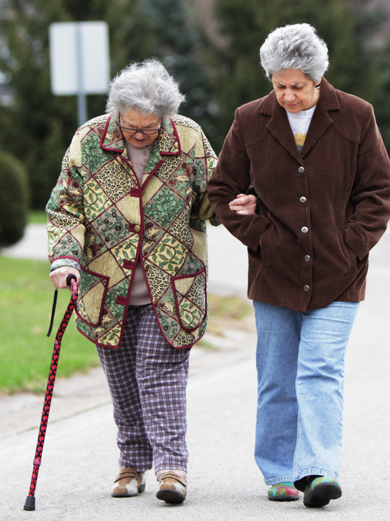Walking with a cane for assistance with mobility.